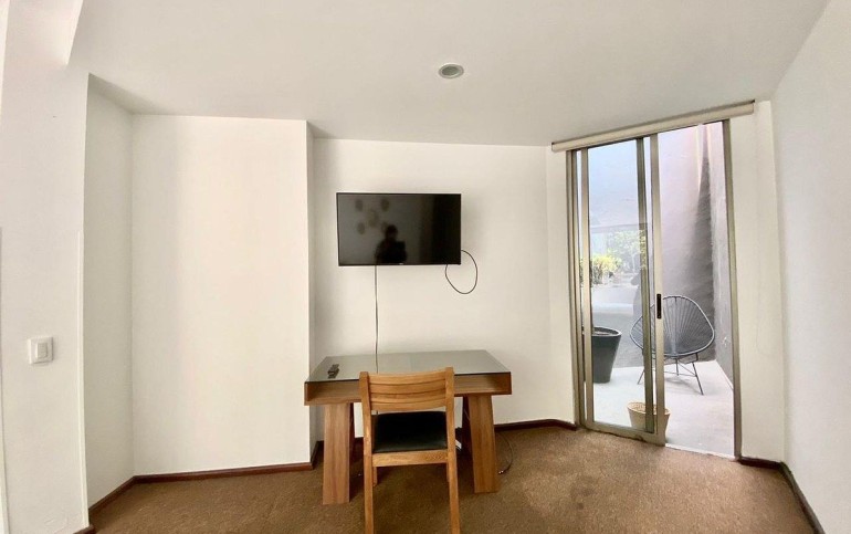 Exclusivo departamento en planta baja con patio privado – San Miguel Chapultepec